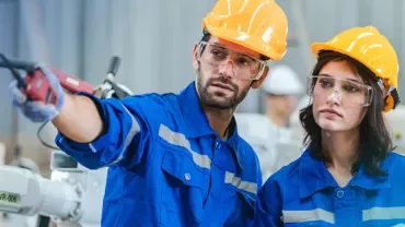 two construction workers in hard hats