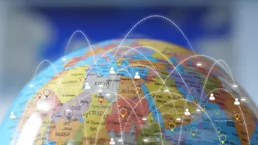 Globe with digital connections across continents.