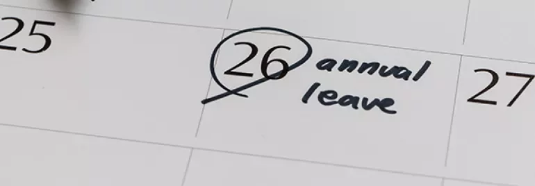 A calendar page with the 26th circled, marked as annual leave.